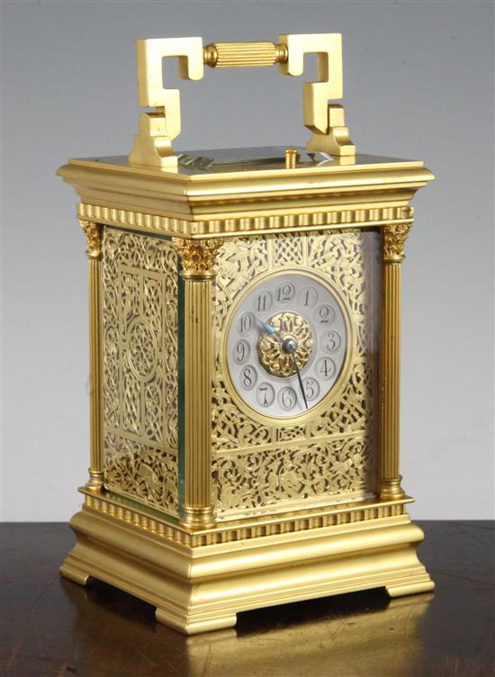 An Edwardian ormolu hour repeating carriage clock, 7in., with original travelling case